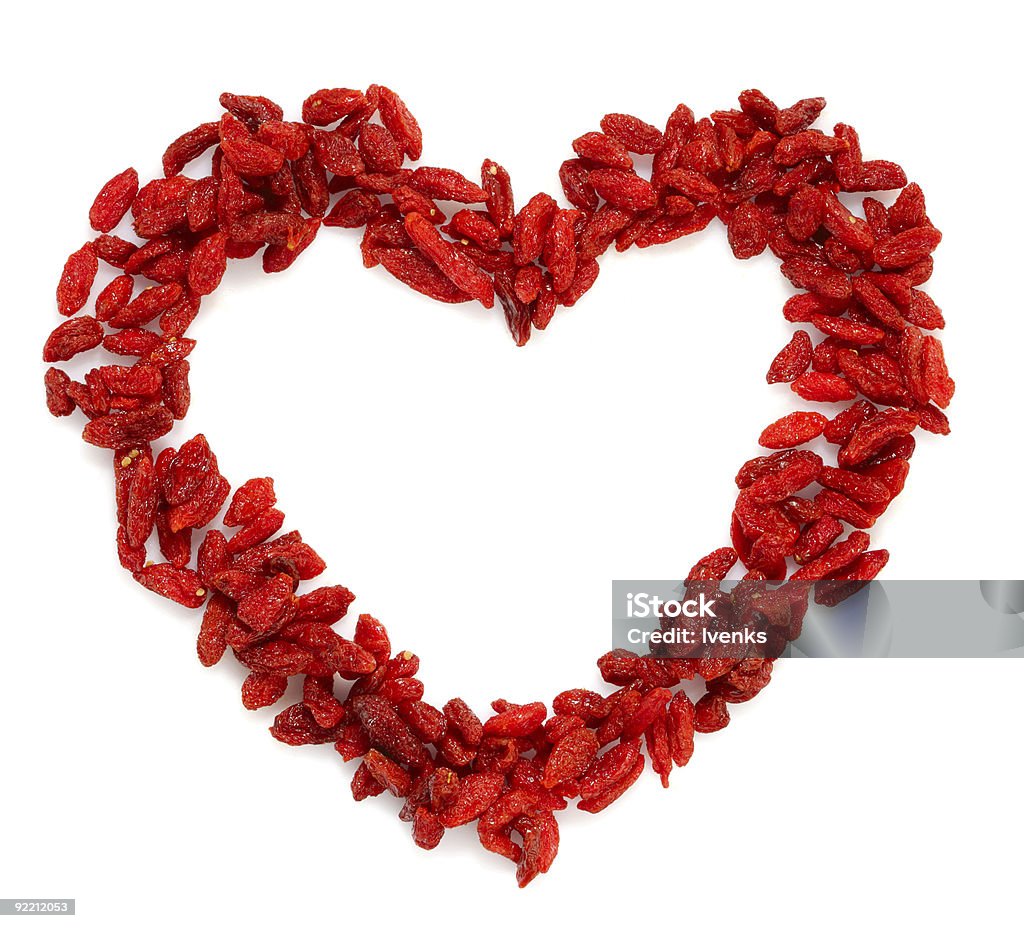 GOJI berryes formato de coração vermelho brilhante cor - Foto de stock de Acima royalty-free
