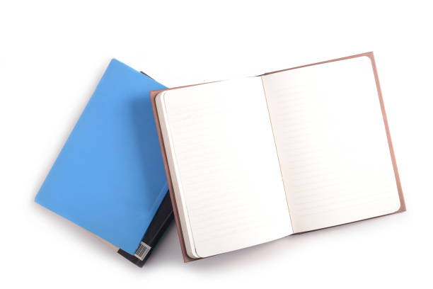 istock Pile of books and open note book. 922127402