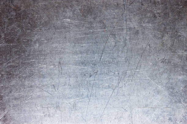 istock Old metal sheet background, brushed silver surface of iron 922129898