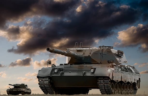 istock Two army tanks on a cloudy day afternoon 92213682