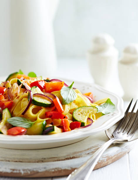 istock Tagliatelle with zucchini, pepper and red onion 922138640
