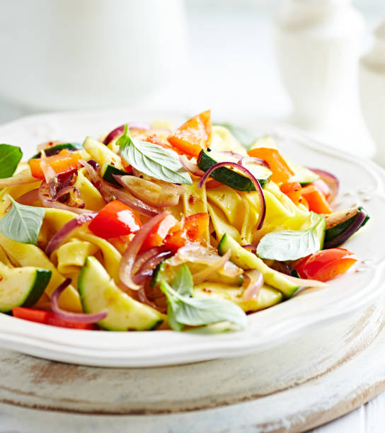 istock Tagliatelle with zucchini, pepper and red onion 922138732