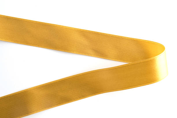 istock gold bow ribbon satin texture isolated on white background 922142020