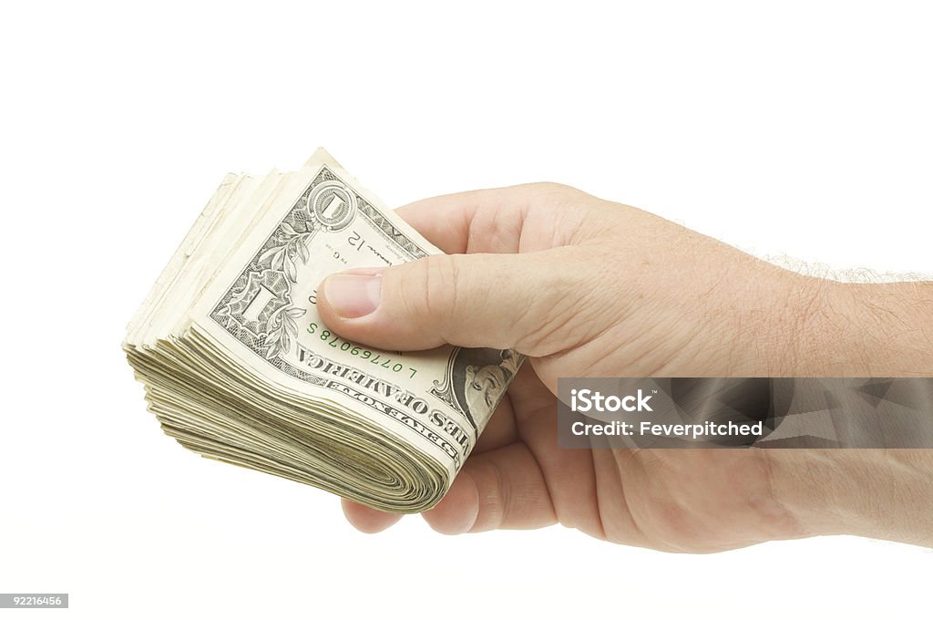 Macho de entregar montón de dinero - Foto de stock de Abundancia libre de derechos