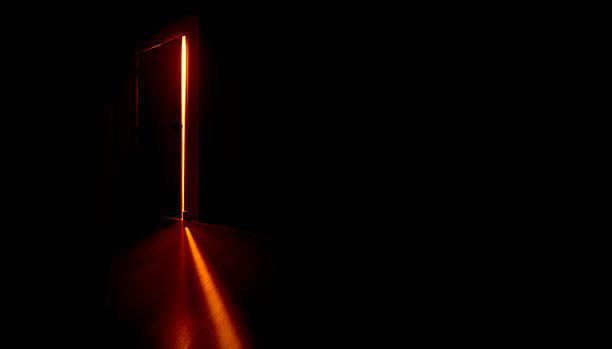 Door opening in the dark Door opening in the dark lightweight stock pictures, royalty-free photos & images