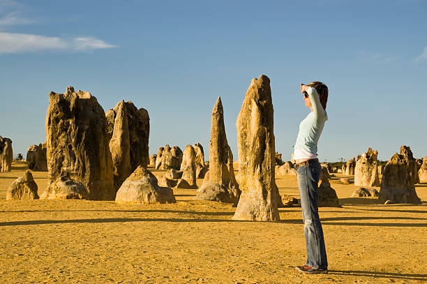 istock WOMAN IN THE PINNACLES DESERT 92217516