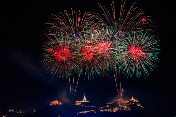istock Fireworks with pagoda and cityscape. 922181304