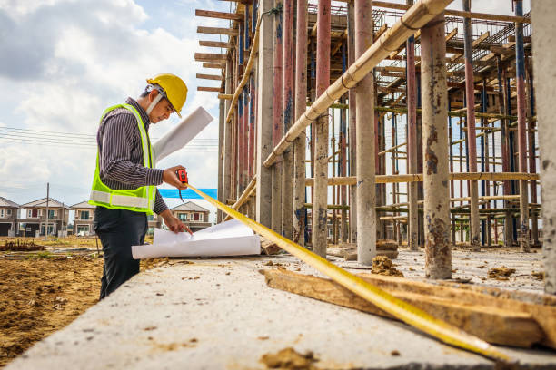 istock Asian business man construction engineer worker at house building site 922181350