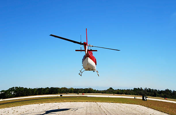 istock Helicopter departing into the horizon 92218495