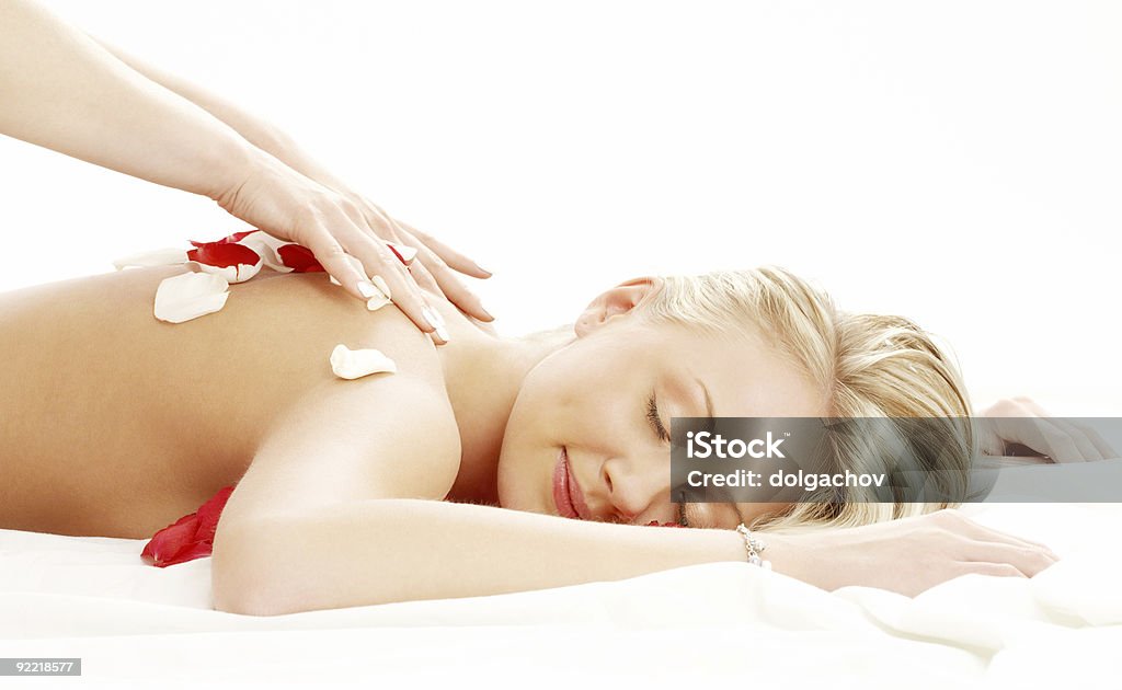 Professionelle massage mit Blütenblättern - Lizenzfrei Blume Stock-Foto