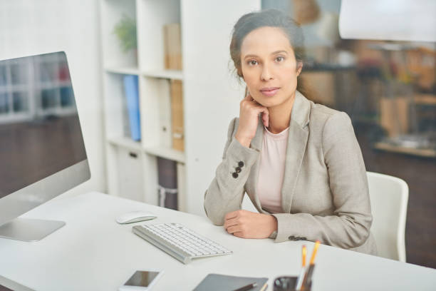 istock Serious confident business lady in office 922189534