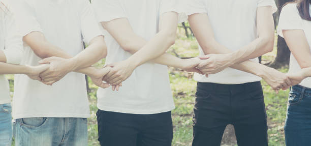 istock Hand of group diversity people volunteer together teamwork 922196684