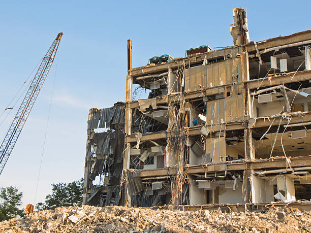 Building demolition with crane stock photo