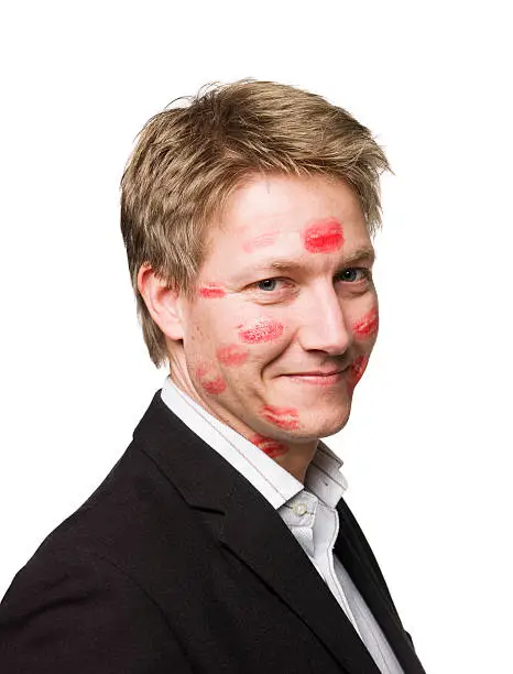 Photo of Man with lipstick all over his face