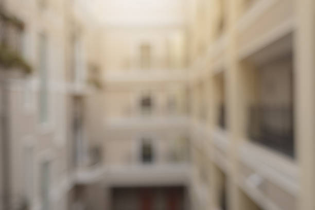 istock Blurred background, yard with balcony inside the building 922206666