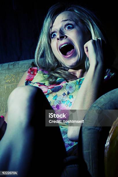 Woman Is Wathcing Tv Stock Photo - Download Image Now - Television Set, Fear, Horror