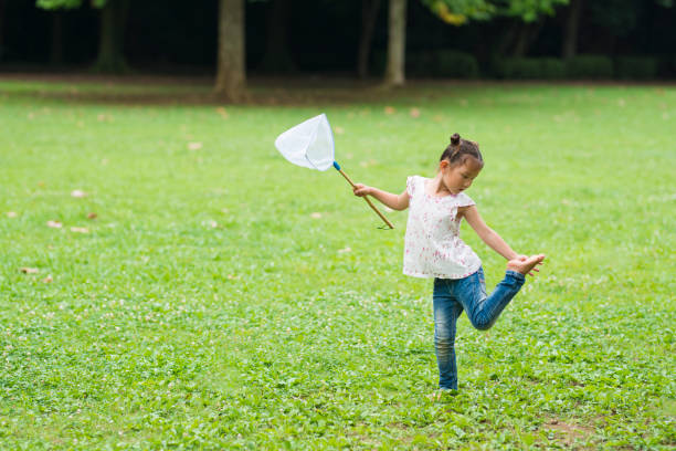 istock Little girl playing barefoot 922207456