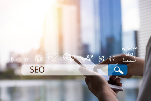 istock Searching Engine Optimizing SEO Browsing Concept, Businessman holding phone for looking information with technology and internet icon 922210362