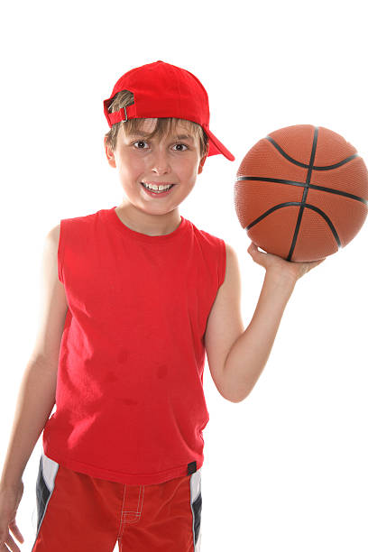 istock Happy child holding basketball 92221178