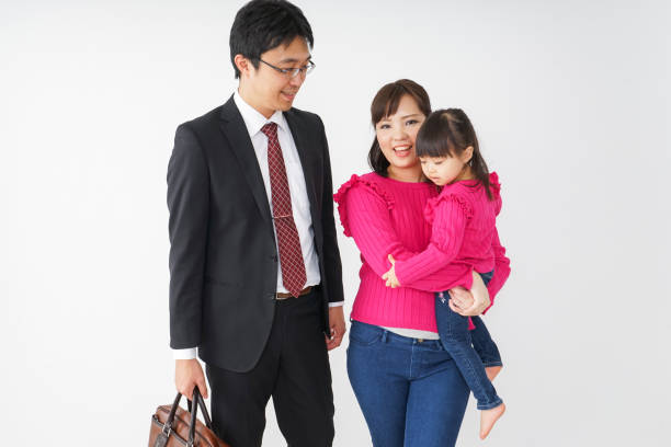 istock Father going to work, mom and daughter 922218264