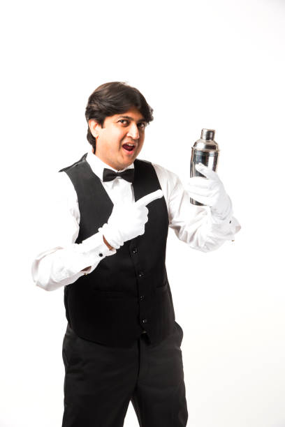 istock Asian Indian waiter or Bartender isolated over white background, selective focus 922221656