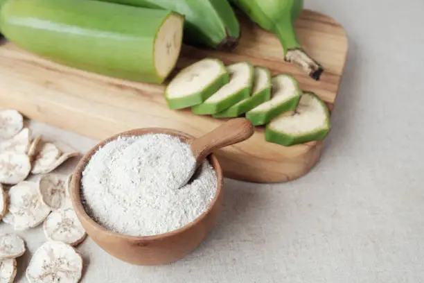 Photo of Raw and dried green bananas, plantain flour, resistant flour, prebiotic food