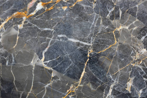 istock Dark gray marble have pattern color gold yellow caused by nature. Abstract marble background. 922224722