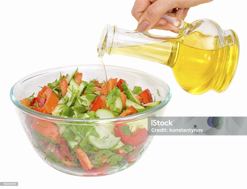 Insalata vegetariana con olio impianto - Foto stock royalty-free di Alimentazione sana