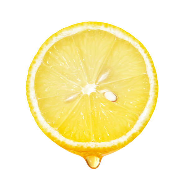 istock Honey dripping from lemon slice isolated on white background 922251844
