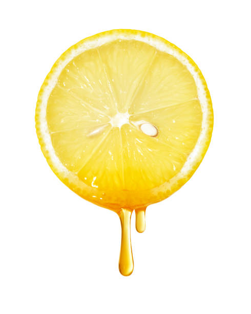 istock Honey dripping from lemon slice isolated on white background 922251856