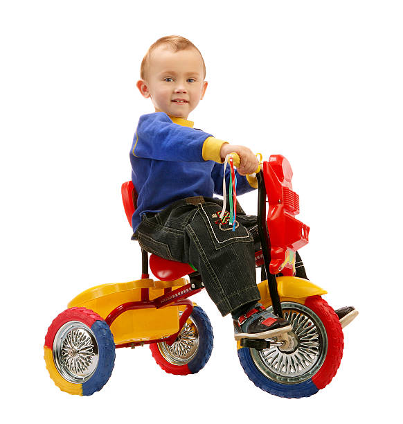 istock Smiling little boy riding a colorful bicycle. 92226341