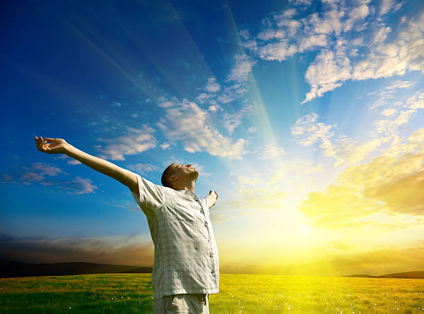 istock Young man relaxing and embracing nature at sunset 92226457