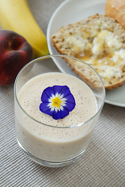 Smoothie with flower stock photo