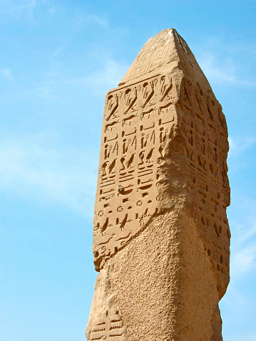 Apex of ancient sandstone needle. Territory of The temple of Amun at Karnak (Ancient Thebes), location: Luxor, Egypt.