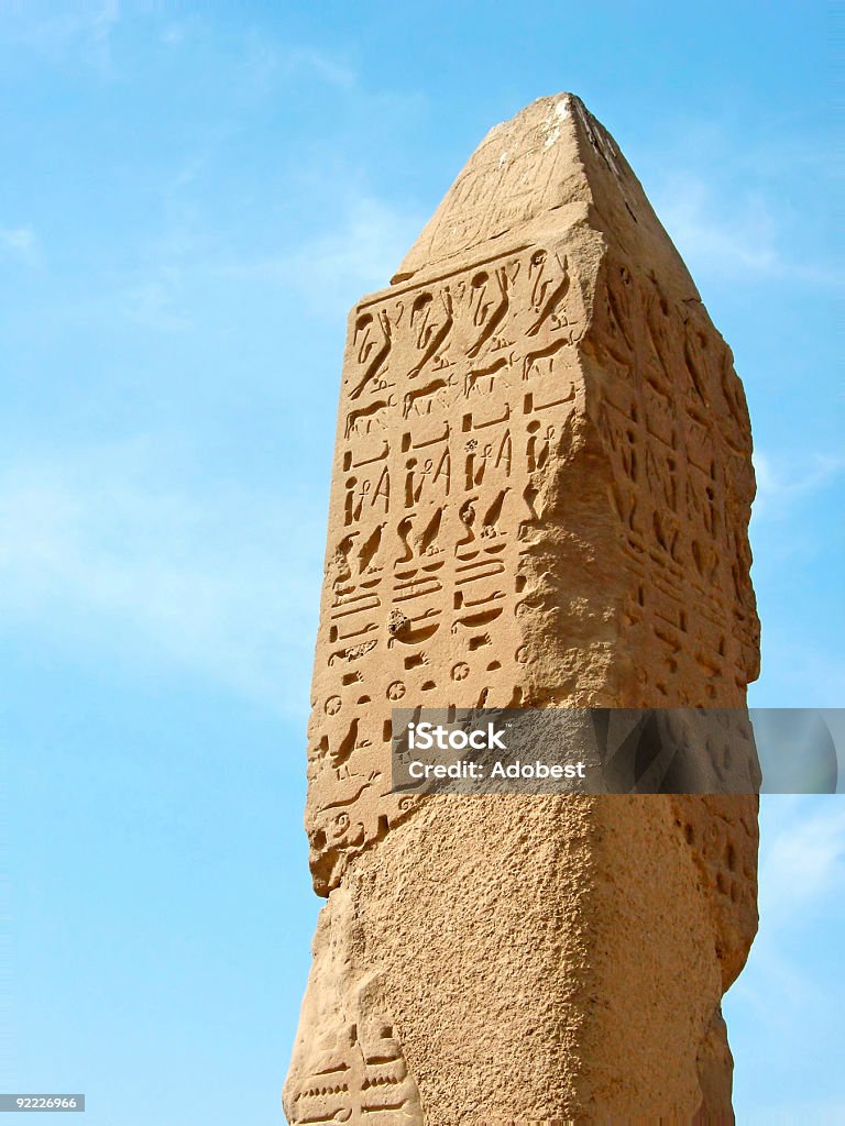 Apex of ancient sandstone needle Apex of ancient sandstone needle. Territory of The temple of Amun at Karnak (Ancient Thebes), location: Luxor, Egypt. Adventure Stock Photo