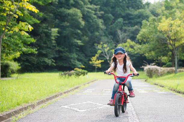 Little girl riding a bicycle
