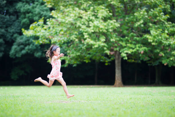 Little girls playing on the lawn