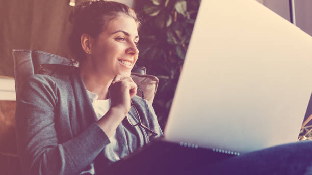 istock Woman working with gadgets in loft office 922285464
