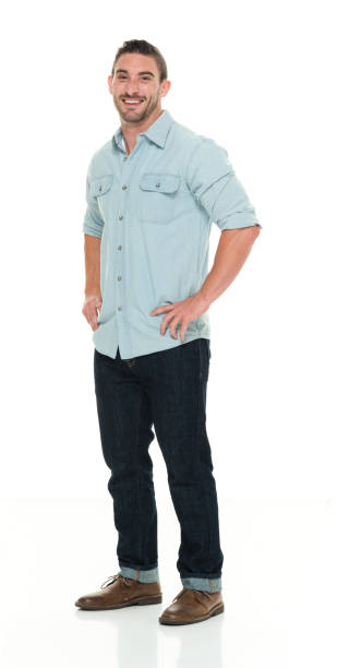 istock Handsome man in casual clothes with hands on hips 922286606