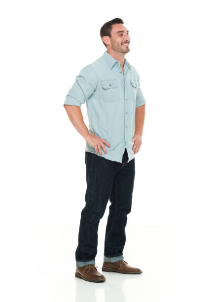 istock Handsome man in casual clothes with hands on hips 922286700