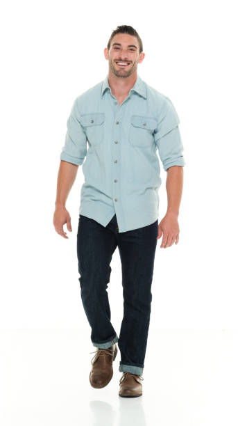 istock Handsome man in casual clothes walking 922288736