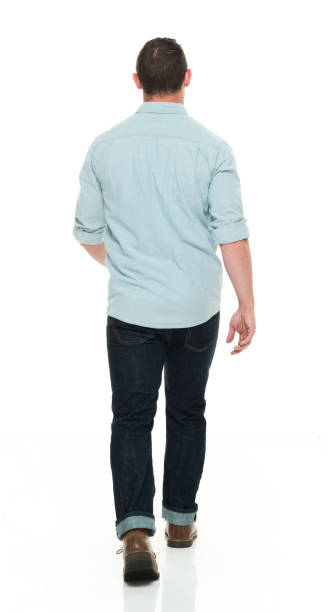 istock Handsome man in casual clothes walking 922288740