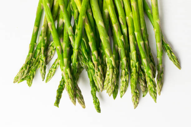 istock Asparagus isolated. Raw asparagus. Fresh Asparagus.Green Asparagus. 922292630