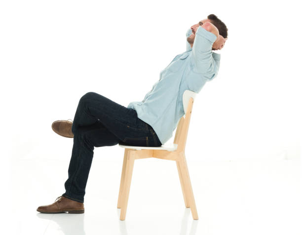 istock Side view of charming man seated 922292674