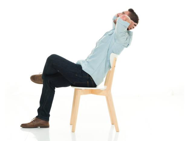 istock Side view of charming man seated 922292694