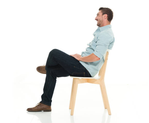 istock Side view of charming man seated 922292954