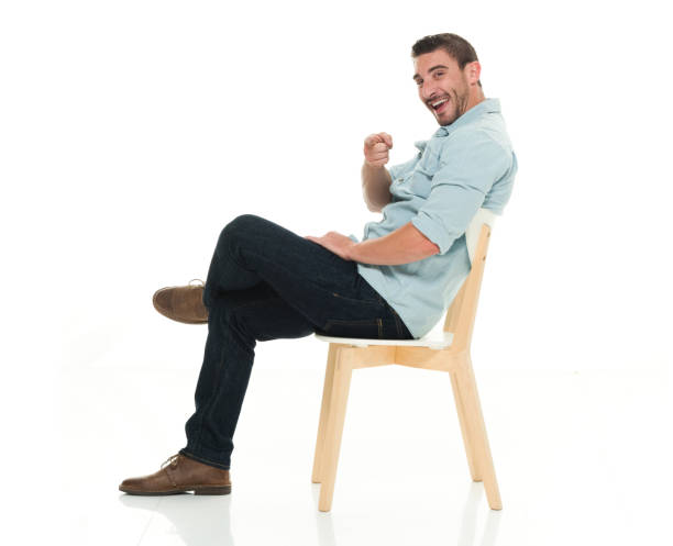 istock Side view of charming man seated 922292962