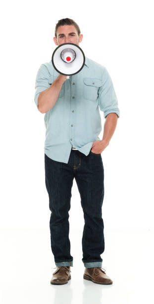 istock Casual man yelling into a megaphone 922292968