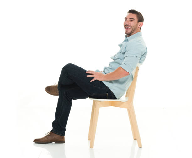 istock Side view of charming man seated 922292984