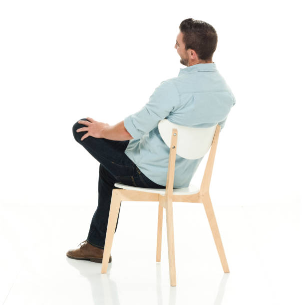 istock Rear view of charming man seated 922295168